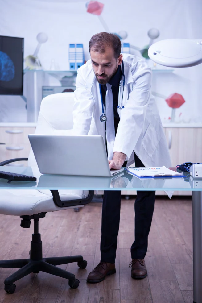 Illustrative clinician reviewing medical resources and plans